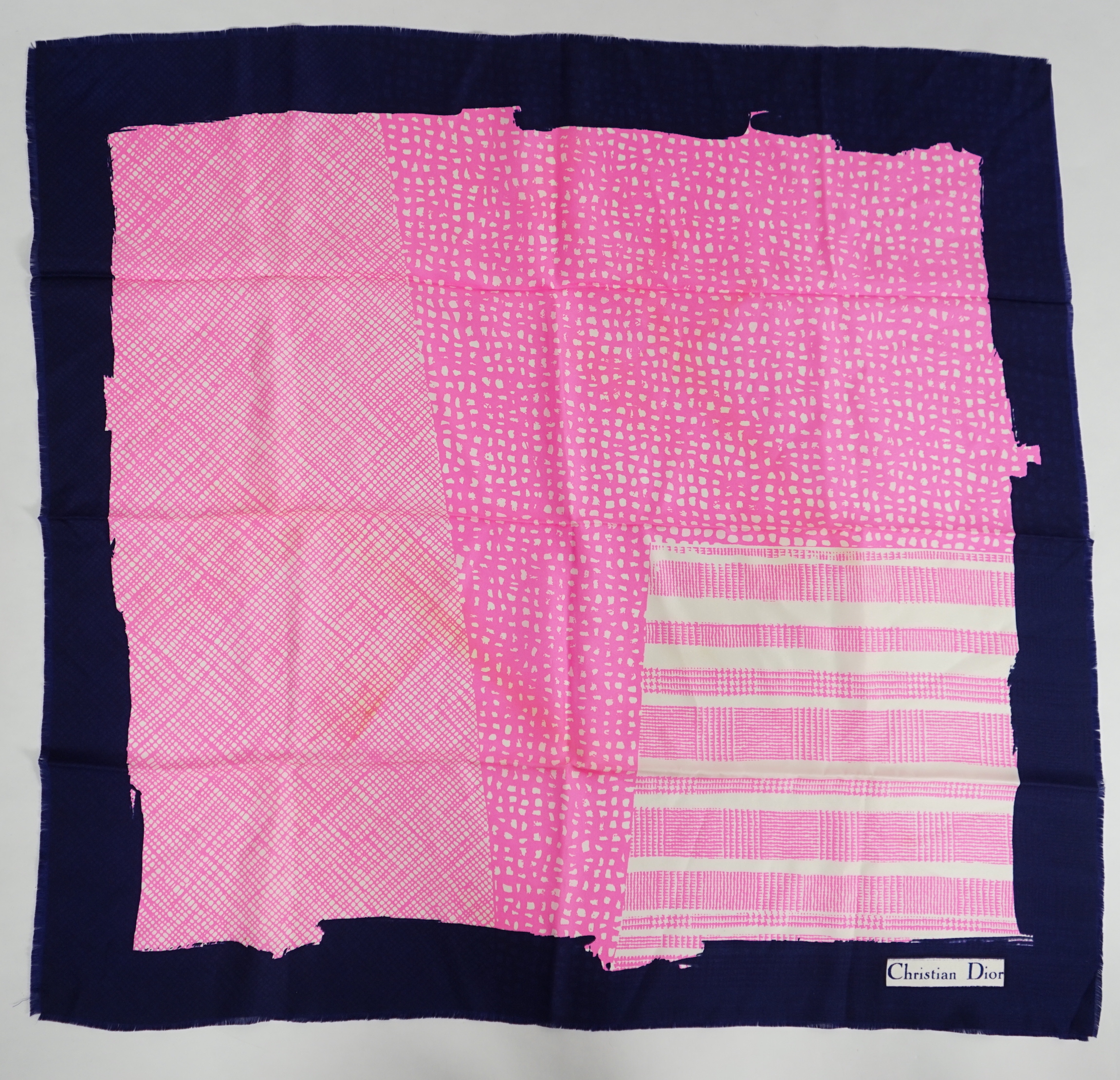 A selection of Yves Saint Laurent, two Christian Dior, Richel and Loewe silk scarves, YSL, 83cm x 85cm Christian Dior: 84cm x 80cm Richel: 87cm x 87cm Loewe: 86cm x 82cm Christian Dior large scarf 120cm x 130cm approx.